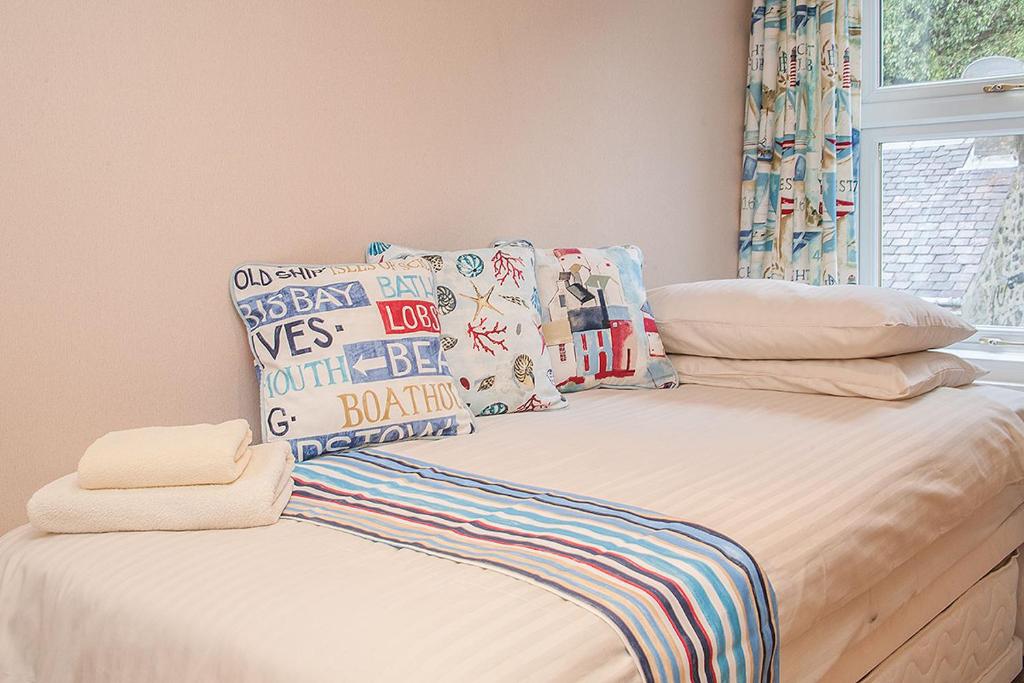 Postel nebo postele na pokoji v ubytování Mishnish Hotel