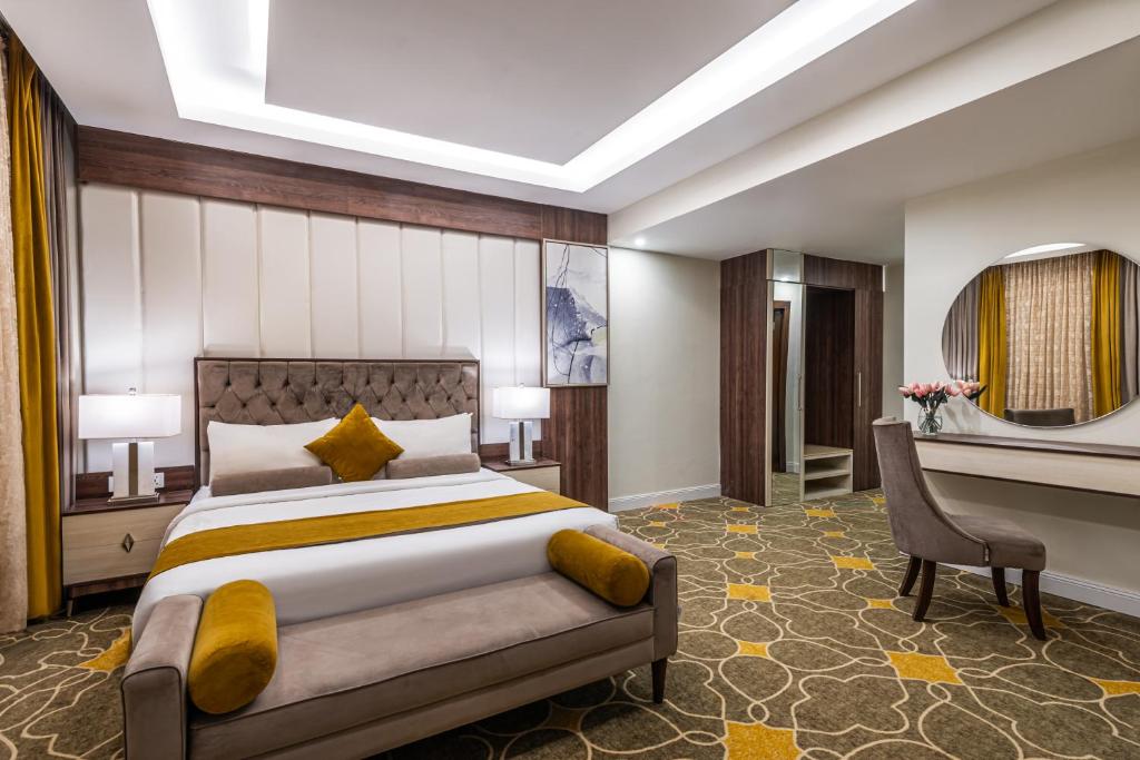Postel nebo postele na pokoji v ubytování Garden Millennium Hotel