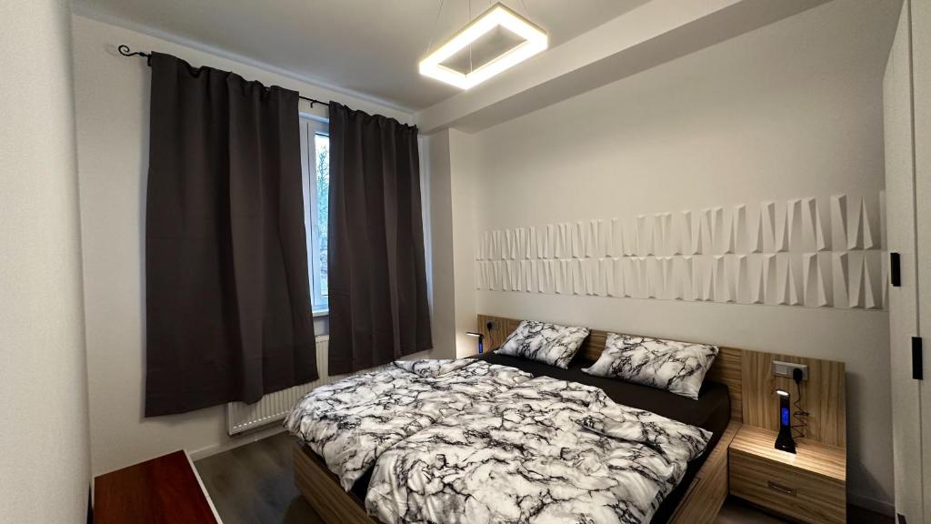 Postel nebo postele na pokoji v ubytování Villa Leopold - apartmánový dům