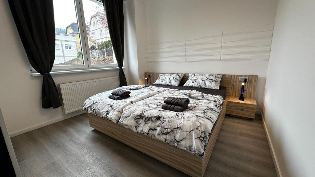 Postel nebo postele na pokoji v ubytování Villa Leopold - apartmánový dům