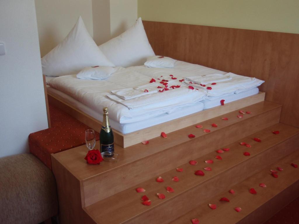 Postel nebo postele na pokoji v ubytování Hotel Panska Licha