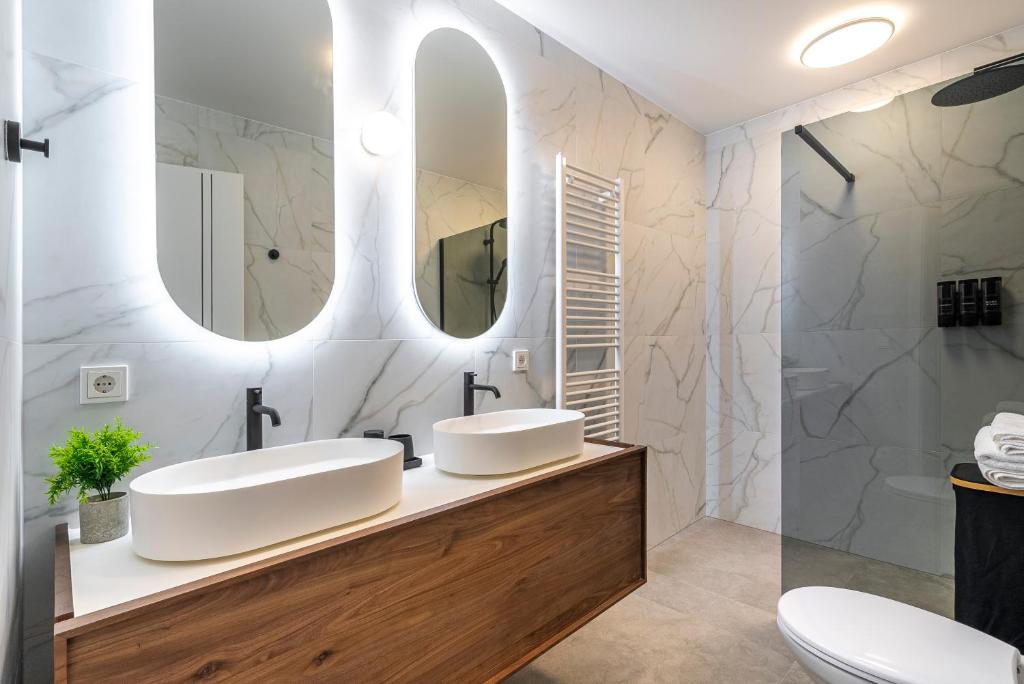 Koupelna v ubytování Luxxy Guesthouse