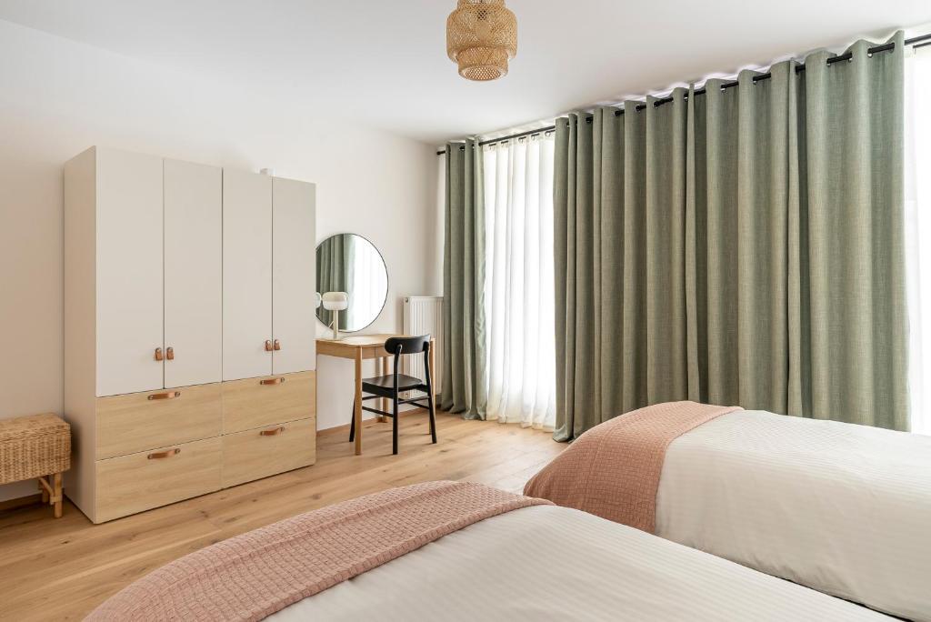 Postel nebo postele na pokoji v ubytování Luxxy Guesthouse