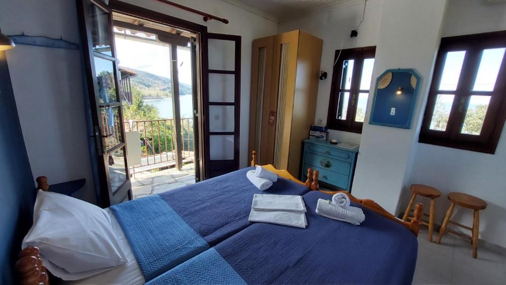 Postel nebo postele na pokoji v ubytování SunRiseStudiosPapanero
