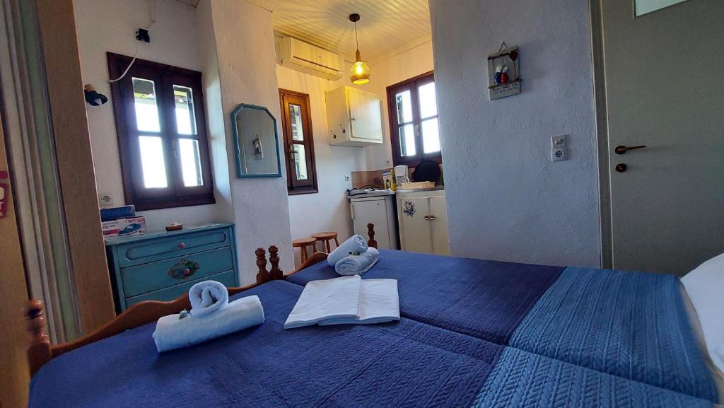 Postel nebo postele na pokoji v ubytování SunRiseStudiosPapanero