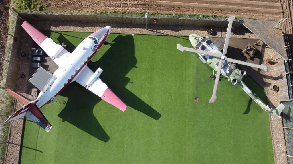 an overhead view of a plane and a helicopter at Jetstream in Boston