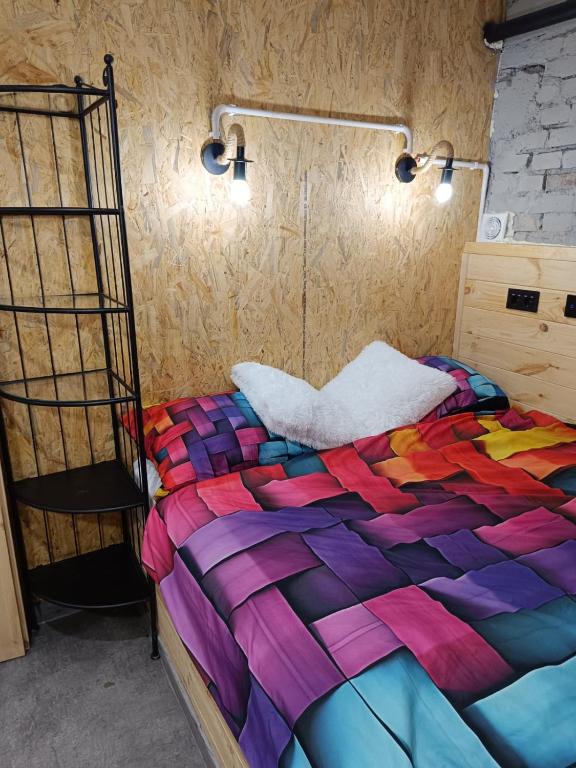 Postel nebo postele na pokoji v ubytování Pokój kapsułowy #2 Centrum