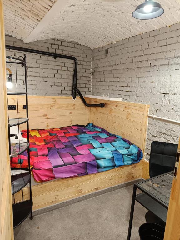Postel nebo postele na pokoji v ubytování Pokój kapsułowy #2 Centrum