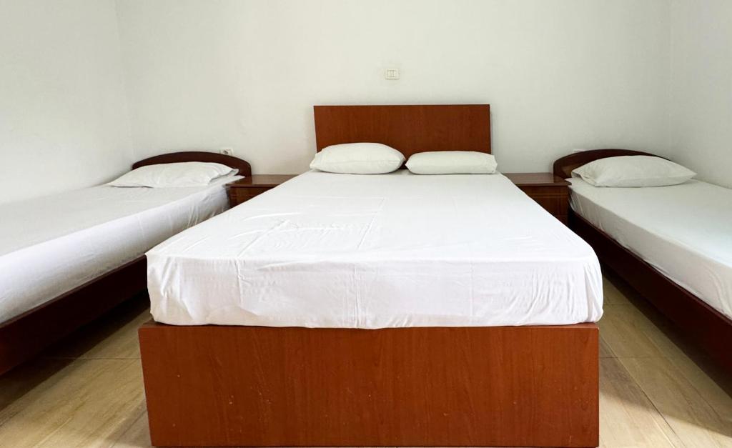Postel nebo postele na pokoji v ubytování Antonia Rooms Qeparo