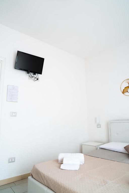 TV a/nebo společenská místnost v ubytování Eulalia Bnb Alghero