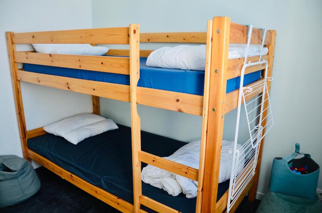 En eller flere senge i et værelse på à quelques pas de la plage