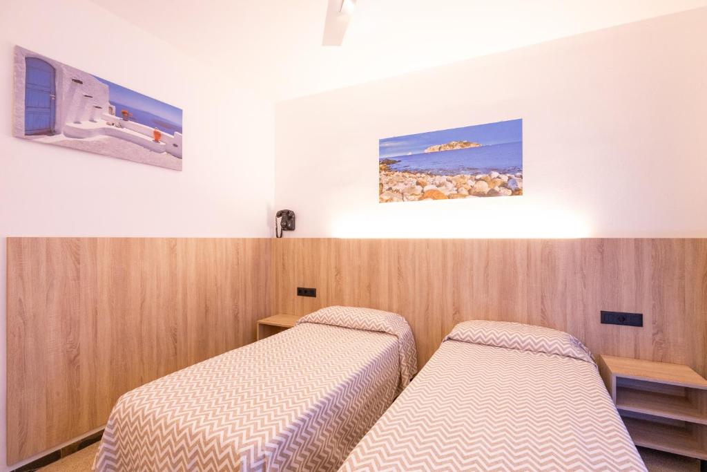 Postel nebo postele na pokoji v ubytování Hotel Bell Aire