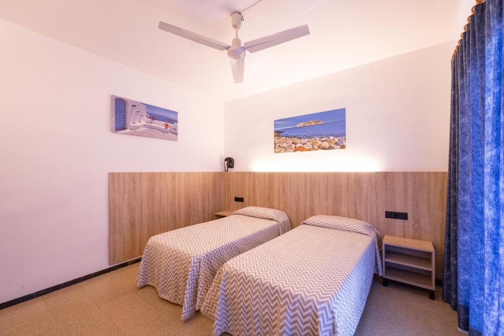 Postel nebo postele na pokoji v ubytování Hotel Bell Aire