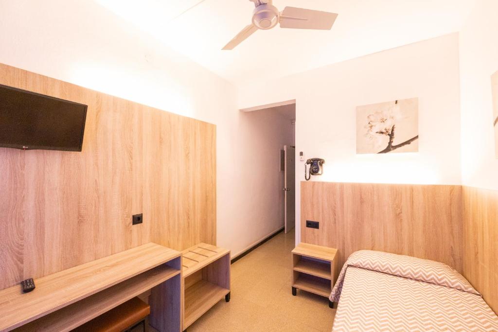 TV a/nebo společenská místnost v ubytování Hotel Bell Aire