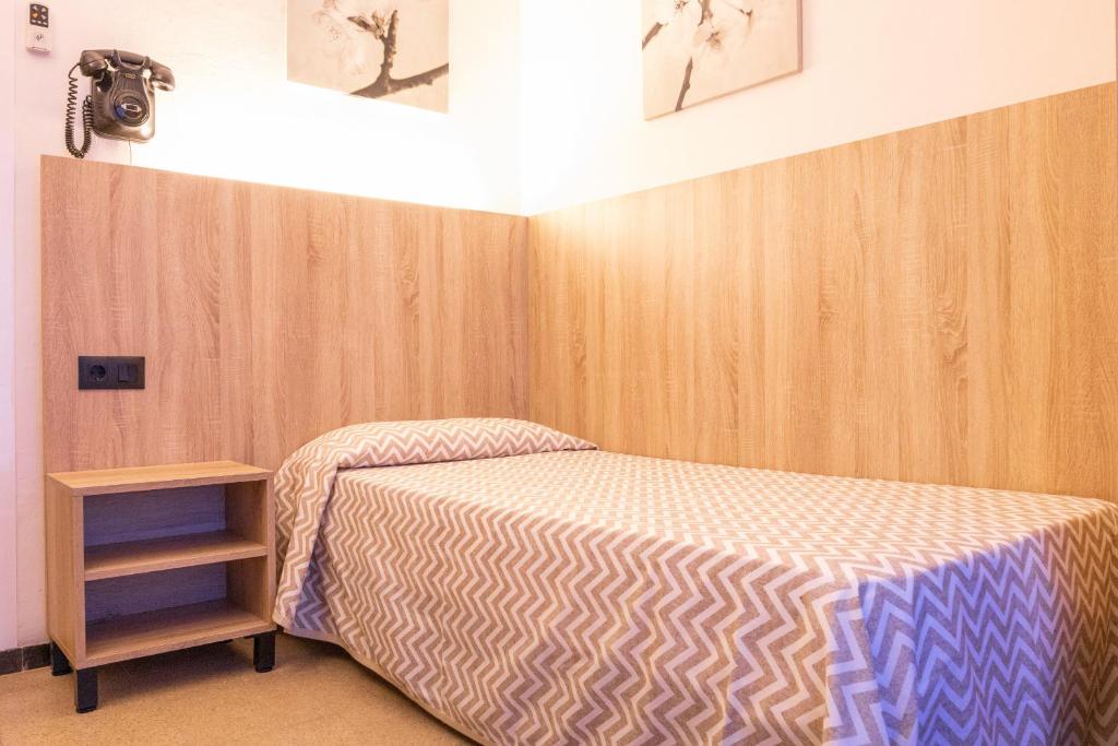 Postel nebo postele na pokoji v ubytování Hotel Bell Aire