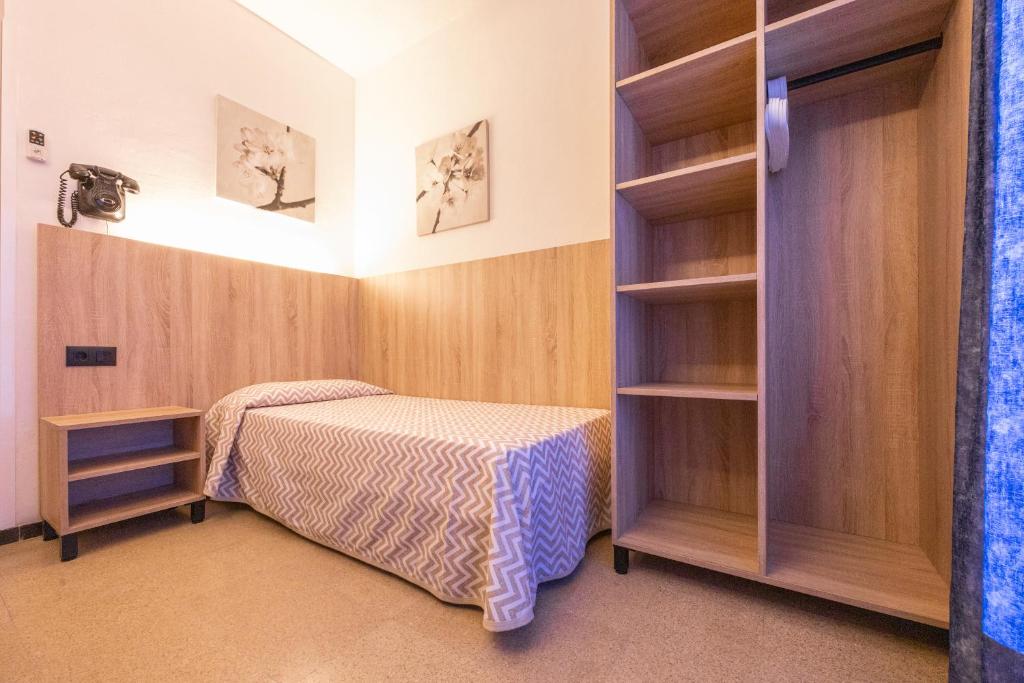 Postel nebo postele na pokoji v ubytování Hotel Bell Aire