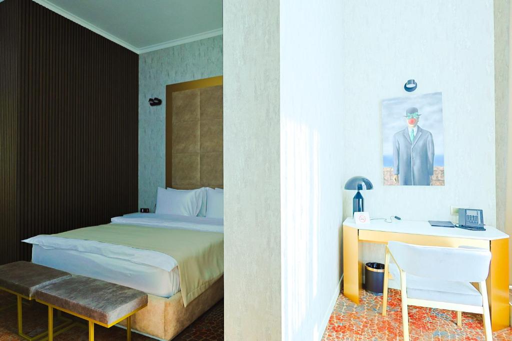 Postel nebo postele na pokoji v ubytování Carat Hotel Yerevan