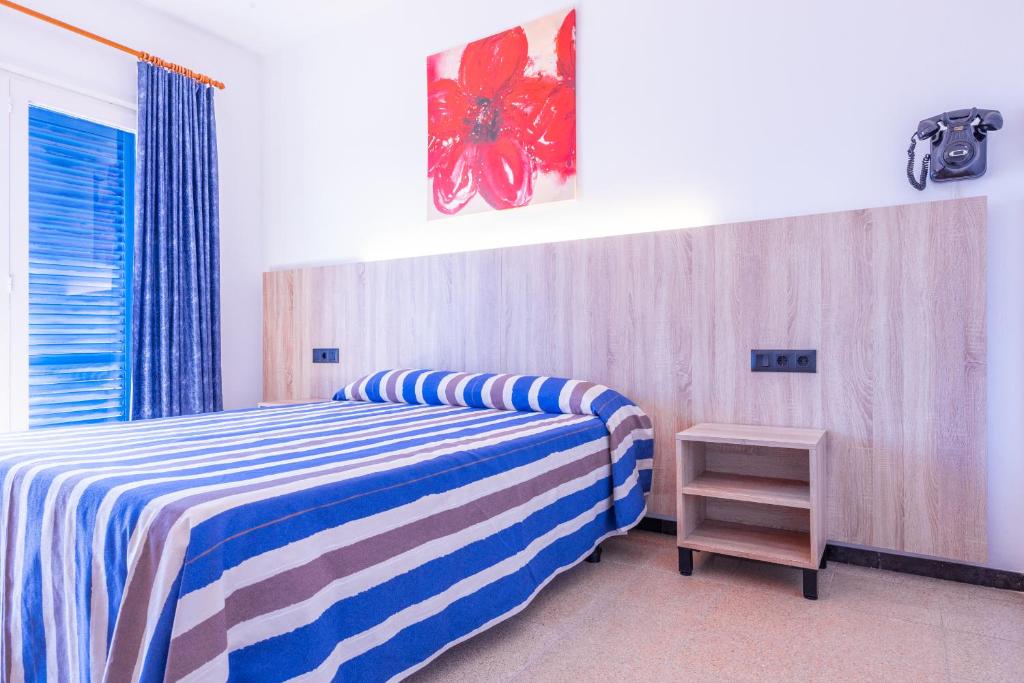 Postel nebo postele na pokoji v ubytování Hotel Bell Aire