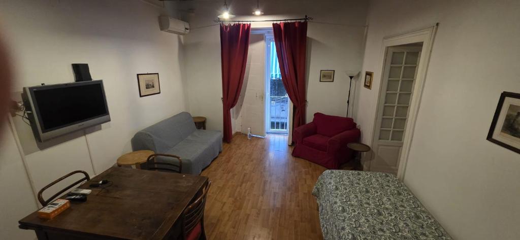 A television and/or entertainment centre at Appartamento Casa Toledo