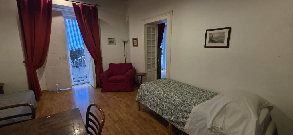 A bed or beds in a room at Appartamento Casa Toledo