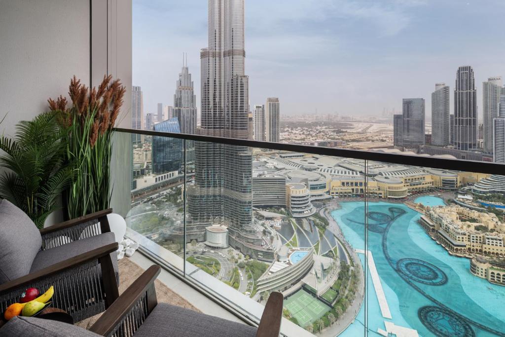a view of a city skyline from a balcony of a building at Bella Elite Homes at Grande Signature Burj and Fountain Great Full View- Brand New Luxury Apartement in Dubai
