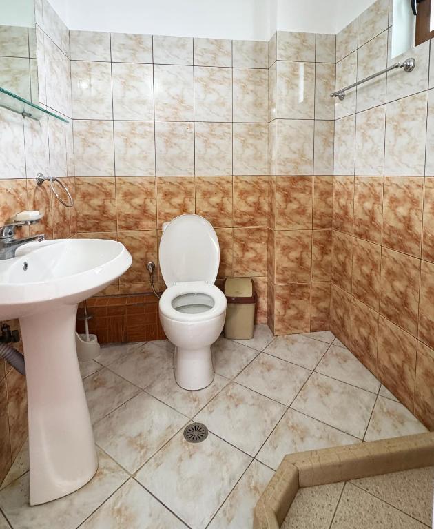 Koupelna v ubytování Antonia Rooms Qeparo