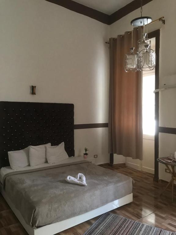 Postel nebo postele na pokoji v ubytování Hotel velvet One