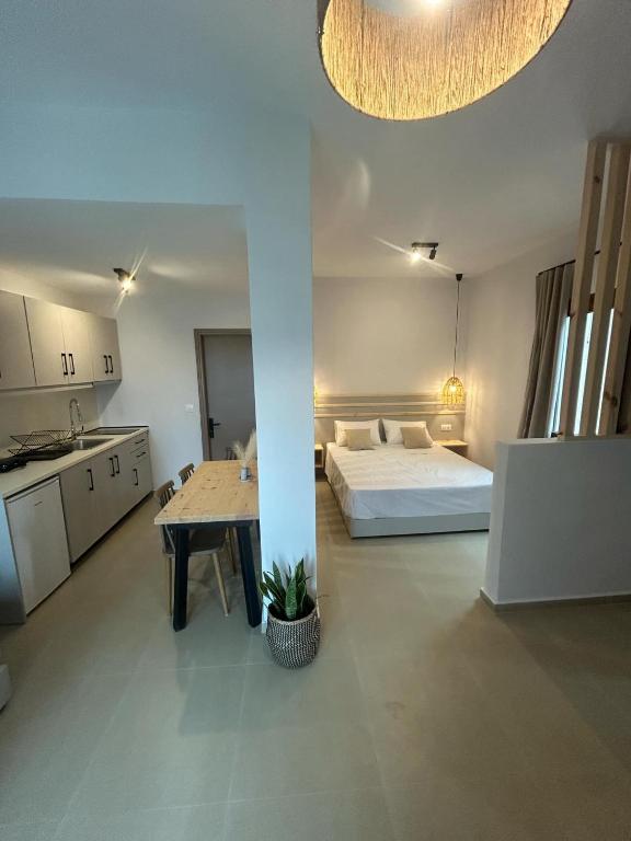 Postel nebo postele na pokoji v ubytování KYNTHIA seaview apartments samos
