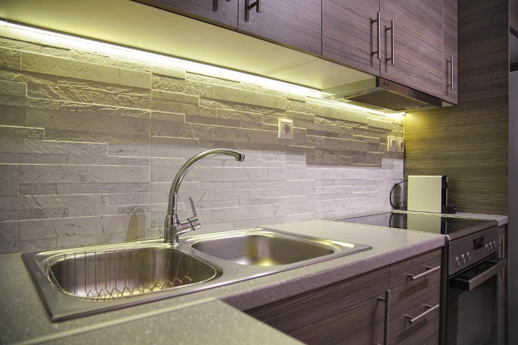 Kuchyň nebo kuchyňský kout v ubytování Sunset Haven Piraeus