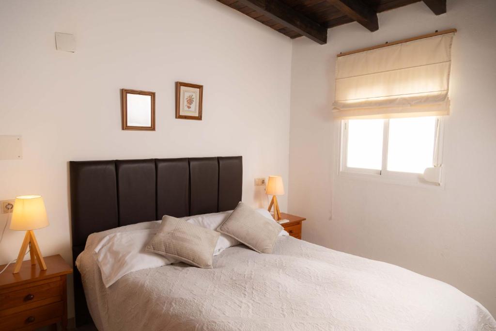 A bed or beds in a room at Apartamento Marina Nacional