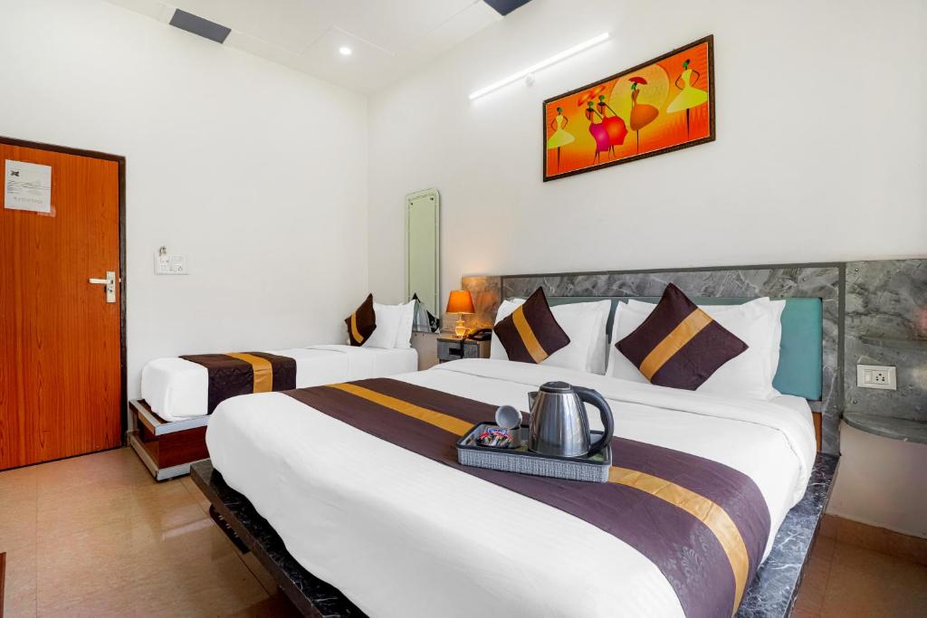 Letto o letti in una camera di Divine Dev Darshan Valley