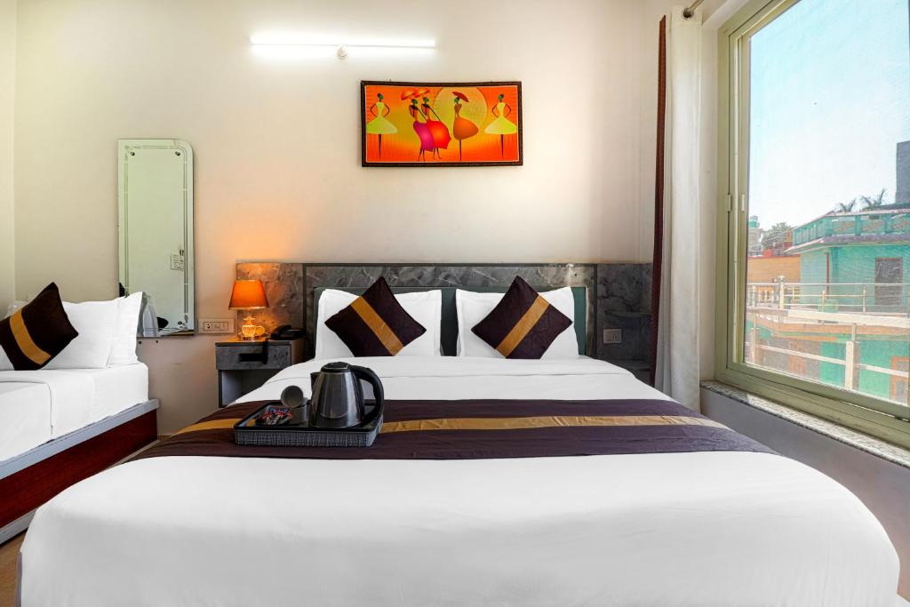 Letto o letti in una camera di Divine Dev Darshan Valley
