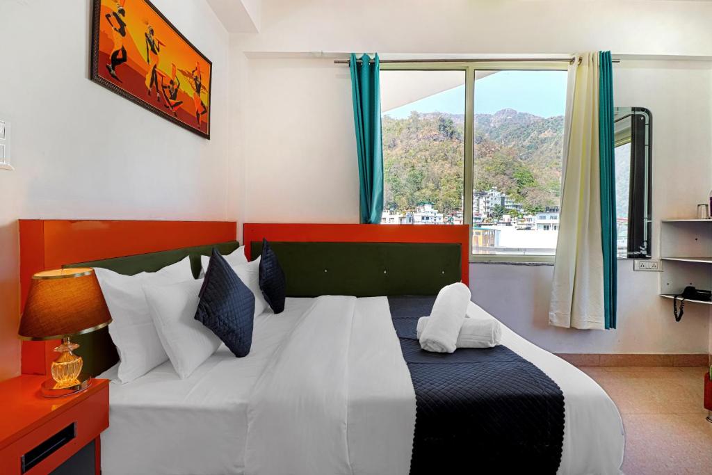 Letto o letti in una camera di Divine Dev Darshan Valley