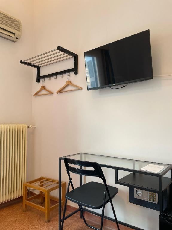 TV a/nebo společenská místnost v ubytování Hotel Michel