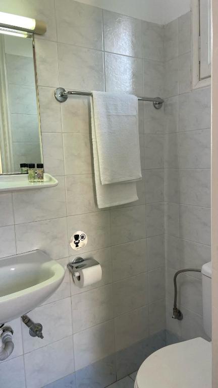 Koupelna v ubytování Hotel Michel