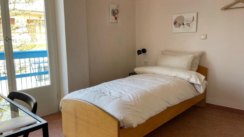 Postel nebo postele na pokoji v ubytování Hotel Michel