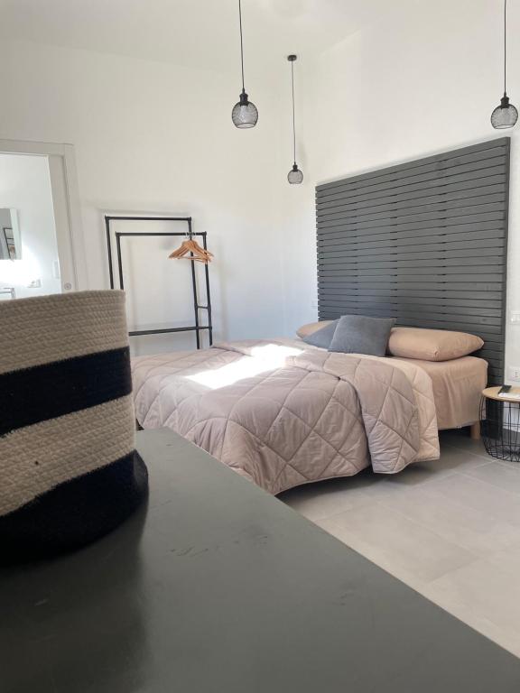Posteľ alebo postele v izbe v ubytovaní B&B BELLAMI'