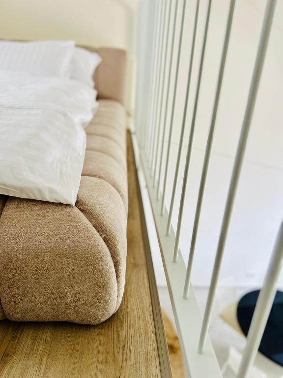 Postel nebo postele na pokoji v ubytování Pálavské Apartmány Original