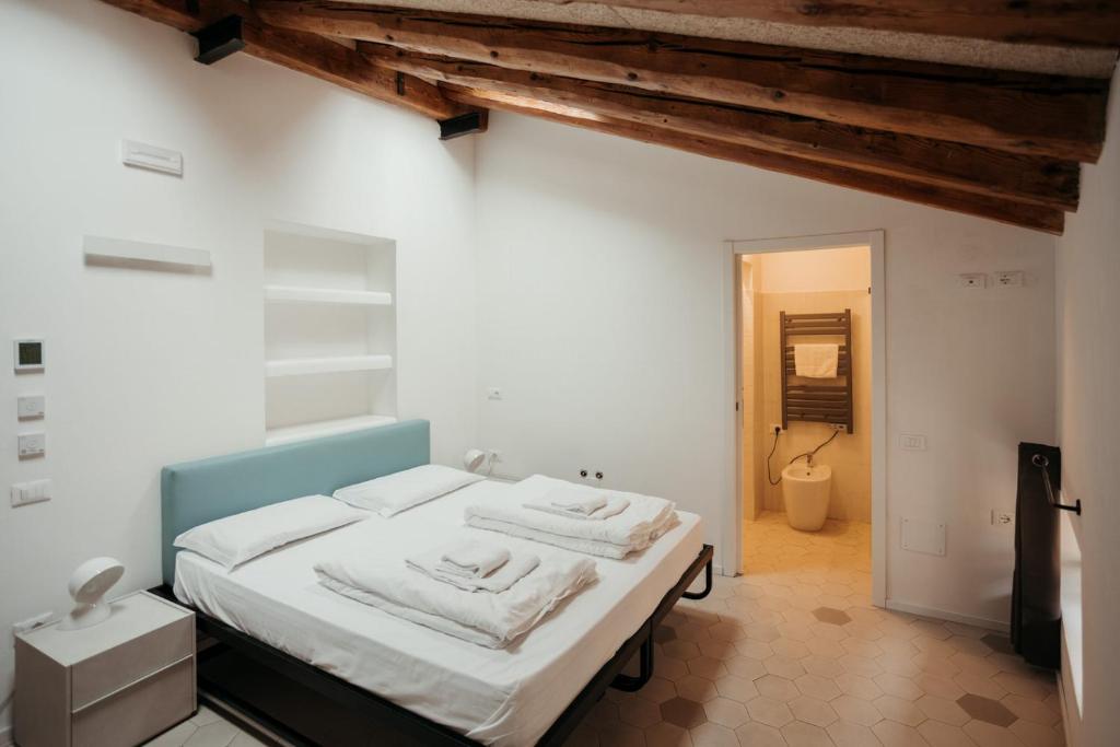 Postel nebo postele na pokoji v ubytování Casali Hostel