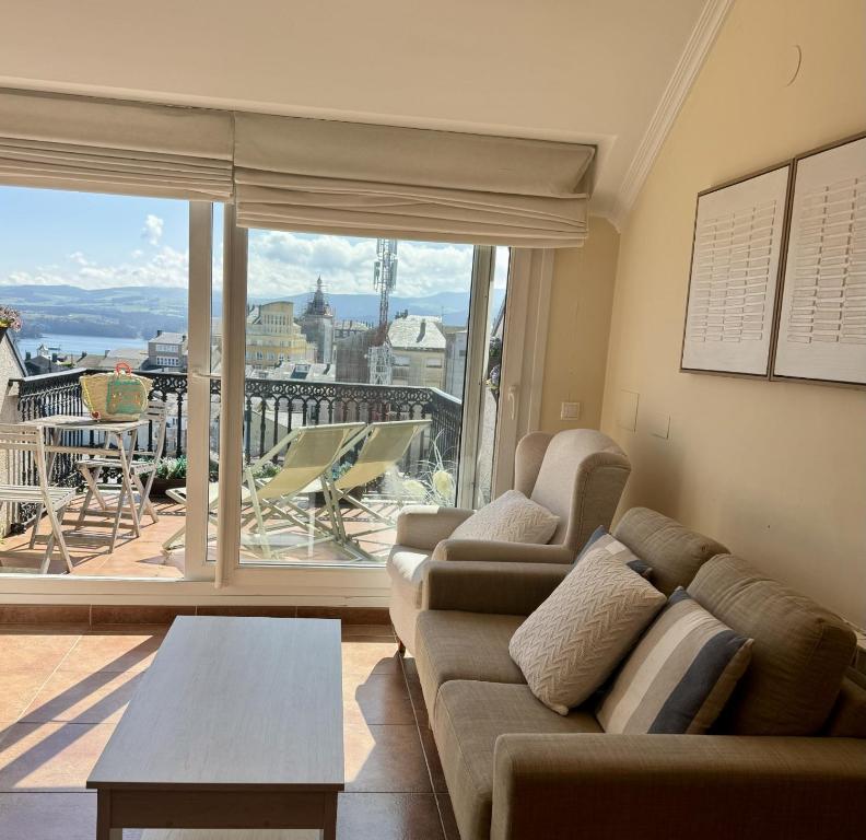 Posezení v ubytování MODERNO PISO CON LA MEJOR TERRAZA DE RIBADEO Y VISTAS MARAVILLOSAS