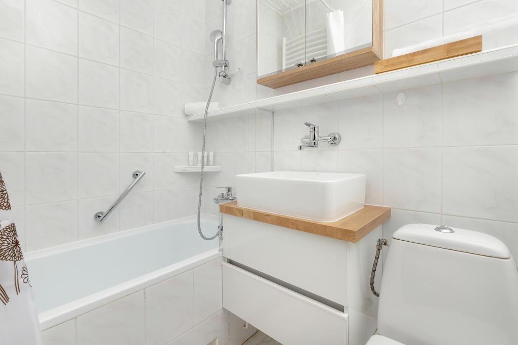 Kúpeľňa v ubytovaní Seaside & Park Apartments Gdańsk by Noclegi Renters