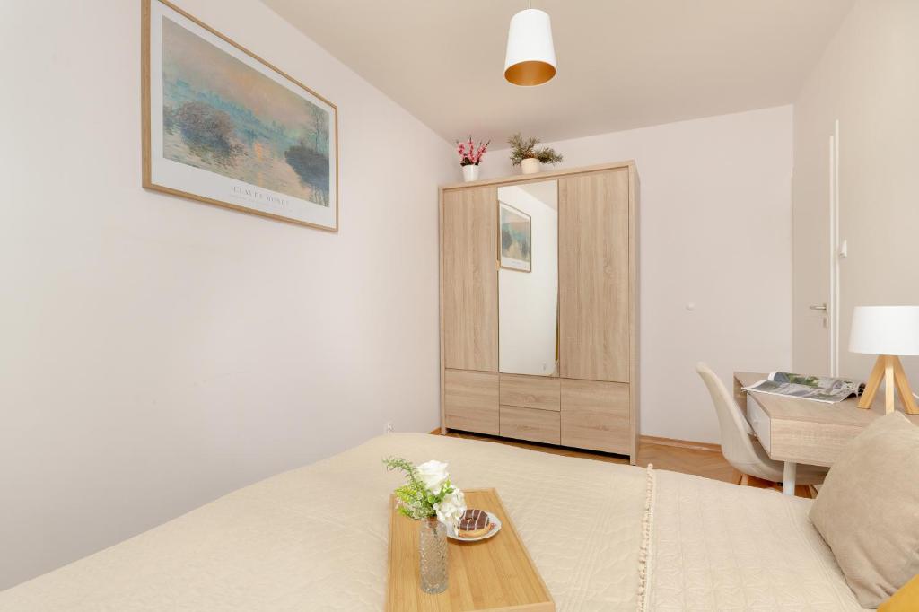 Posteľ alebo postele v izbe v ubytovaní Seaside & Park Apartments Gdańsk by Noclegi Renters