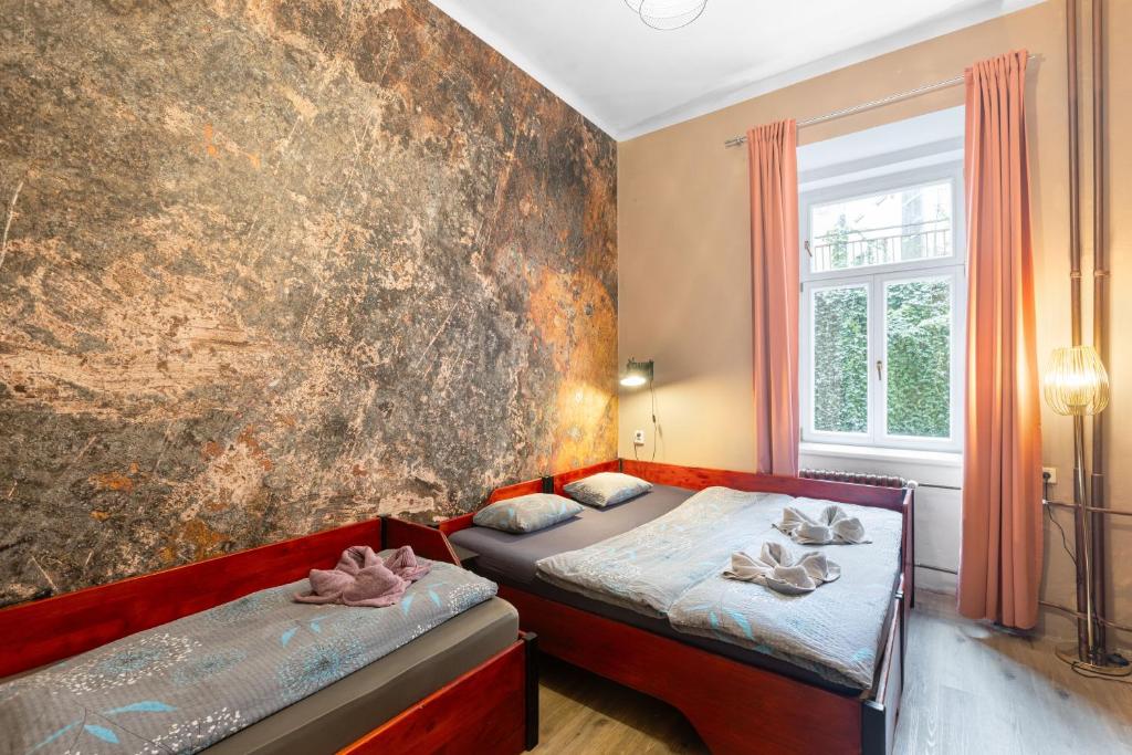 Postel nebo postele na pokoji v ubytování Hostel Elf
