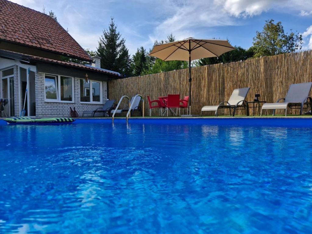 Πισίνα στο ή κοντά στο Harmony Home