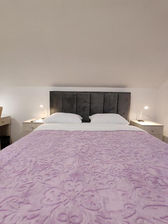 Postel nebo postele na pokoji v ubytování Rooms DM - Una