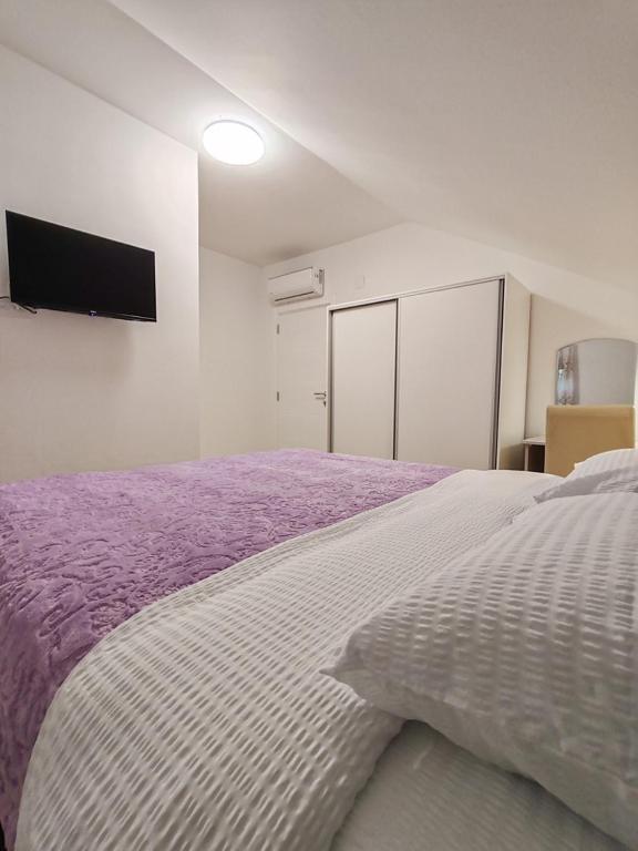 Postel nebo postele na pokoji v ubytování Rooms DM - Una