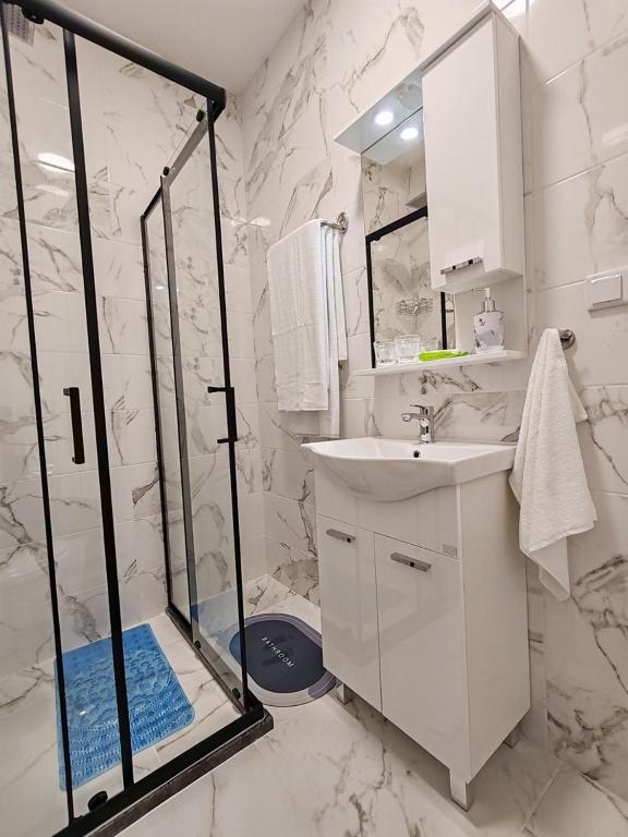 Koupelna v ubytování Rooms DM - Una
