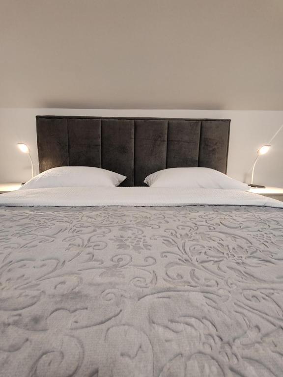 Postel nebo postele na pokoji v ubytování Rooms DM - Una