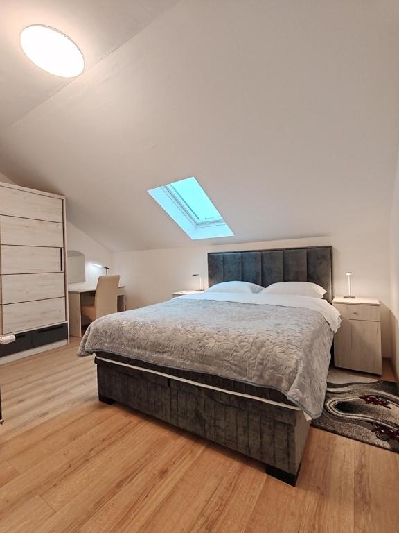 Postel nebo postele na pokoji v ubytování Rooms DM - Una