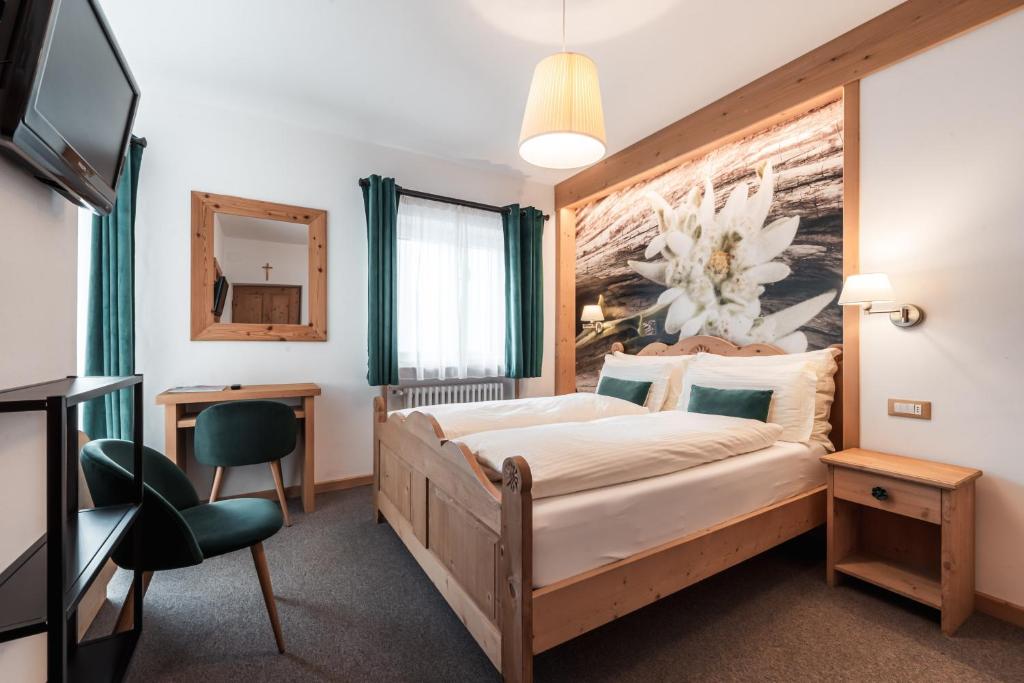Postel nebo postele na pokoji v ubytování Albergo Majorka